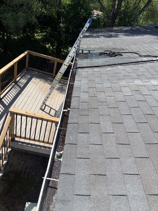 Gutter Cleaning and Additional Downspout Installation